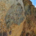 stone coloured by copper and iron minerals