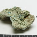 pale yellowish-green specimen of cuprian melanterite which has dehydrated over time during storage