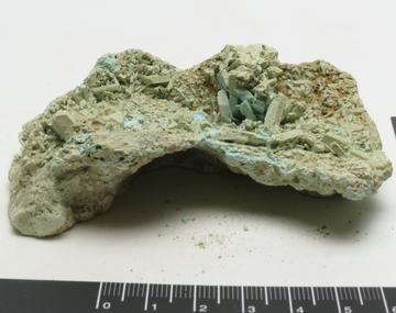 A specimen of cuprian melanterite from National Museum Wales Cardiff, originally attributed as chalcanthite. It has dehydrated to a pale green-blue. 